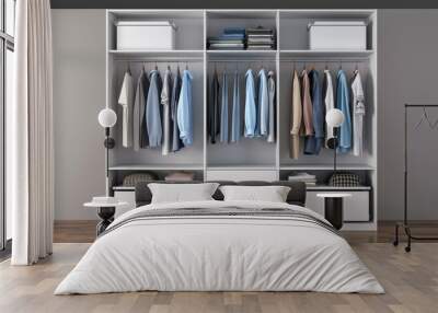 Organized modern wardrobe with neatly arranged clothing, storage boxes, and folded items, showcasing clean and minimalist storage solutions. Wall mural