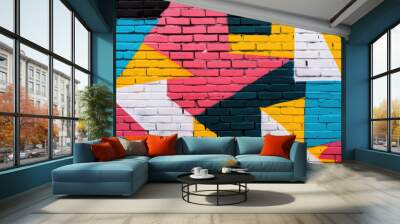 Vibrant geometric street art mural on a brick wall featuring bold colors and abstract shapes, showcasing urban creativity and colorful graffiti design. Wall mural