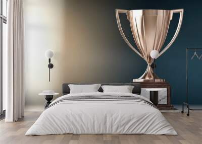 Bronze trophy on a marble base against a blurred background. Wall mural