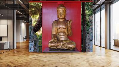 Antique Buddha statue in Japanese Zen Garden  Wall mural