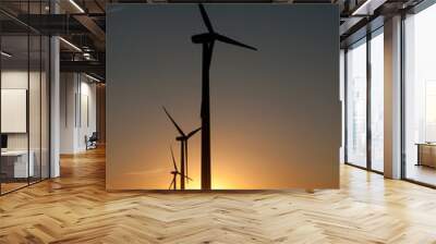 Wind farm at sunset Wall mural