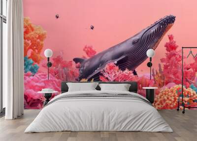 A whale is swimming in a pink and orange ocean Wall mural