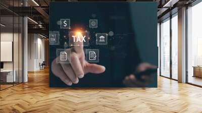 Businessman use smartphone to complete Individual income tax return form online for tax payment. Financial research,government taxes and calculation tax return concept. Tax and Vat concept. Wall mural