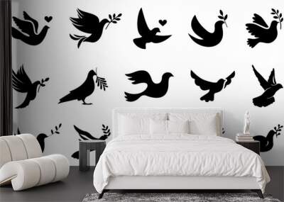 Dove or pigeon icon collection. Peace doves silhouette. Flying pigeon with branch icon. Dove of peace icon. Flying bird Wall mural