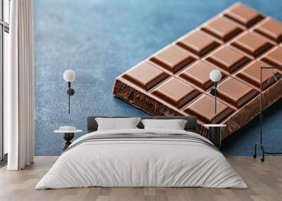 A chocolate bar with squares on it Wall mural