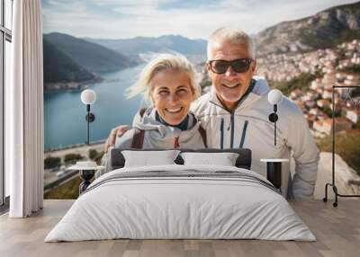 A couple of adult active people on a morning run. Portrait with selective focus Wall mural