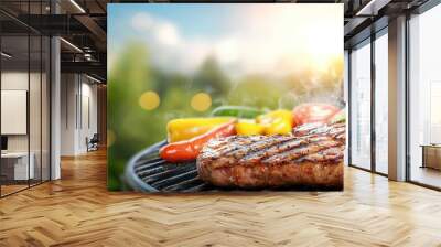 A grill with two pieces of meat and vegetables on it Wall mural