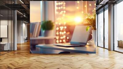 a laptop computer sitting on desk next to plant Wall mural