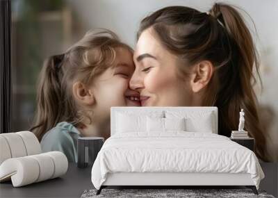 A mother and daughter are hugging each other Wall mural