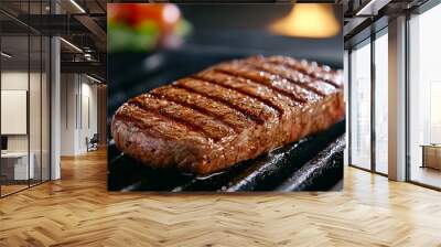 A piece of meat is on a grill, with the grill marks visible Wall mural