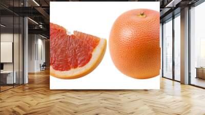 A slice of grapefruit is shown next to a whole grapefruit Wall mural