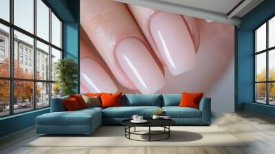 A woman's hand with long, painted nails Wall mural