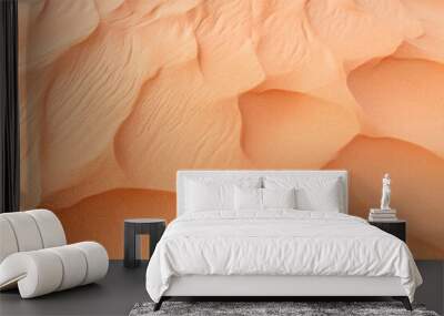 Abstract texture background in trendy color Peach Fuzz. Background with selective focus and copy space Wall mural