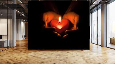 Burning candle in the hands of a man with selective focus. AI generated, human enhanced Wall mural