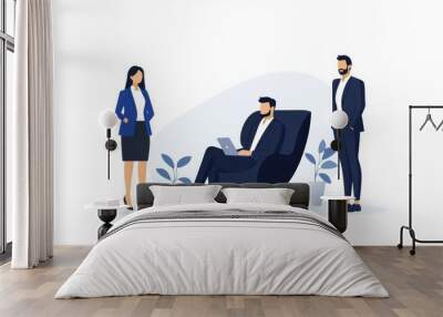 Three men and a woman are sitting in a room Wall mural