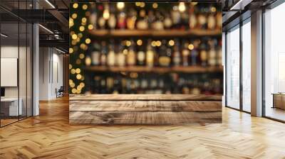 A blurry shot of a bar with a wooden counter and shelves full of liquor Wall mural