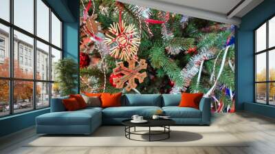 Happy new year cozy home interior with christmas tree and garlands small balls. blurred lights golden bokeh.Merry Christmas background. Wall mural