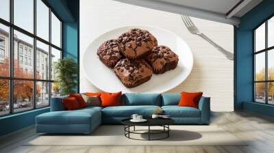 dark chocolate brownies topped by chocolate chips Wall mural