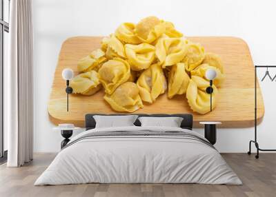 Italian traditional tortellini pasta on white background Wall mural