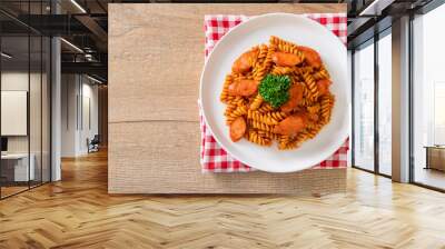 spirali or spiral pasta with tomato sauce Wall mural