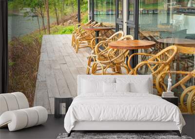 wood table and chair in cafe restaurant Wall mural