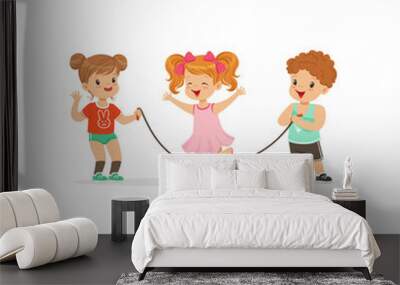 Flat vector illustration of little boy and two girls playing with jumping-rope. Outdoor activity or game concept Wall mural