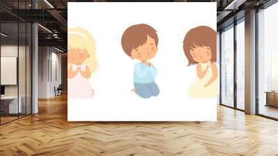 Little Kid Kneeling and Praying with Folded Hands Vector Set Wall mural