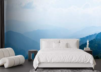 Mountain in fog, mountain ridge and valley with morning sky landscape. Wall mural