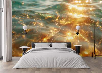 Surface water waves of sea with golden light tone, texture of glitter water and soft waves with sun glare and ripple. Wall mural