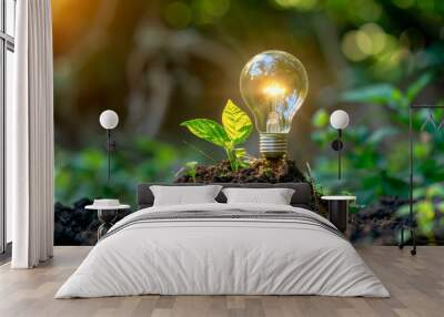 sustainable energy, environmental friendly, renewable energy concept. light bulb with plant and gree Wall mural