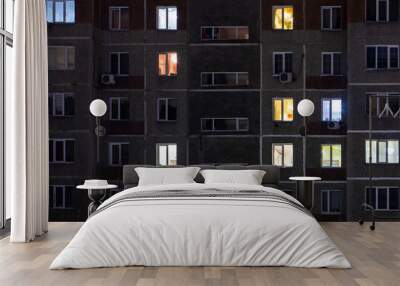 Night view of exterior apartment building. High rise apartments in night light Wall mural