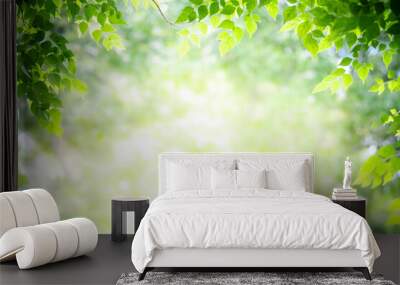 Concept nature view of green leaf on blurred greenery background in garden and sunlight with copy space using as background natural green plants landscape, ecology, fresh wallpaper concept. Wall mural