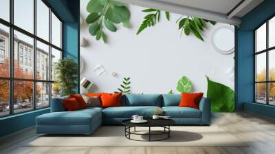 beauty and cosmetic products with leaves arranged on a  242e60e0-d365-4954-b8cb-d48f6a8a8618 Wall mural