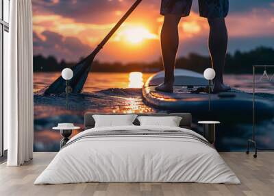 the guy standing on a standup paddleboard during suns efc2622e-6aec-483c-bfb2-d256be31d536 1 Wall mural