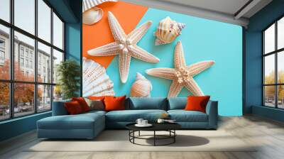 two starfish sitting alongside seashells on a blue ba a0454300-9732-410e-8514-d07f4f92147a 1 Wall mural