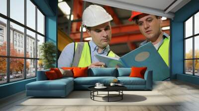 The workers working in factory with colleague or team, technician discussing together about repair and maintenance the machine in industry Wall mural