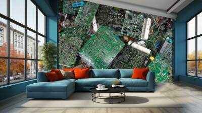 Scrap yard printed circuit board electronic waste for recycling with selective focus. main board electronic waste Wall mural