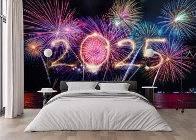 Sparkler 2025 text colorful firework illumination on dark blue sky background, happy new year 2025 concept Wall mural