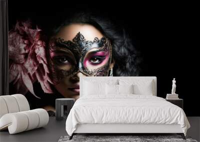 Beautiful dark model woman wearing a pink venetian masquerade mask with black background makes eye contact. Cosplay, Venetian mask. Mardi Gras Mask, AI generative Wall mural