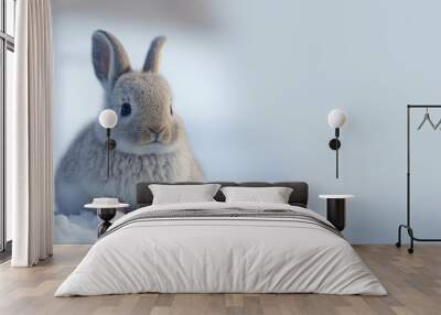 Cute Easter bunny rabbit resting in a fresh blanket of snow.  Small brown cotton tail in an open field winter landscape. A cute Easter image created with generative ai	 Wall mural