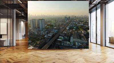 Aerial view of Bangkok downtown, Sky train railway, Cars on traffic road and buildings, Thailand. Wall mural