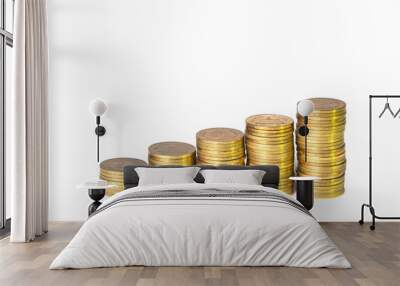 Golden coin stacks isolated on white background. Wall mural