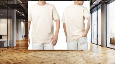 Young man in blank beige t-shirt mockup front and back used as design template, isolated on white background with clipping path. Wall mural