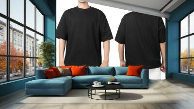 Young man in blank oversize t-shirt mockup front and back used as design template, isolated on white background with clipping path. Wall mural