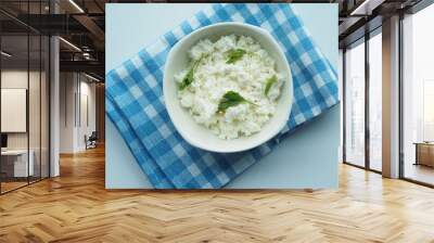 fresh paneer in a bowl on a table  Wall mural