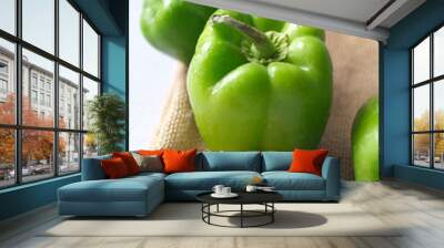 green color capsicum on wooden background  Wall mural