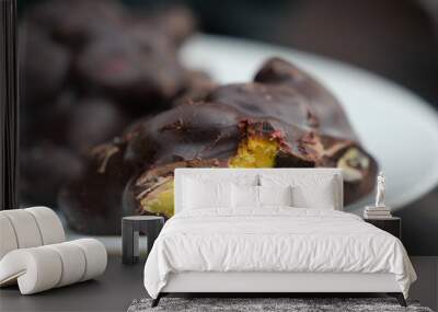 Indulge in the delightful combination of Delicious Dark Chocolate Almond and Pistachio Treats Wall mural