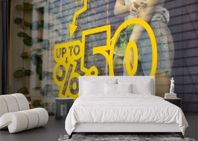 Large Sale text letters on clothing store . Wall mural