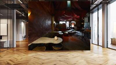 Living room with low tables with matching stools and wooden stools and chillout decoration Wall mural