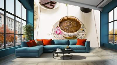 Black Coffee in Cup with Dark Chocolate Pieces Wall mural